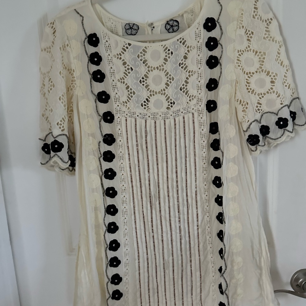 Anthropologie’s Floreat Ivory Lace Top with Dark Floral Details